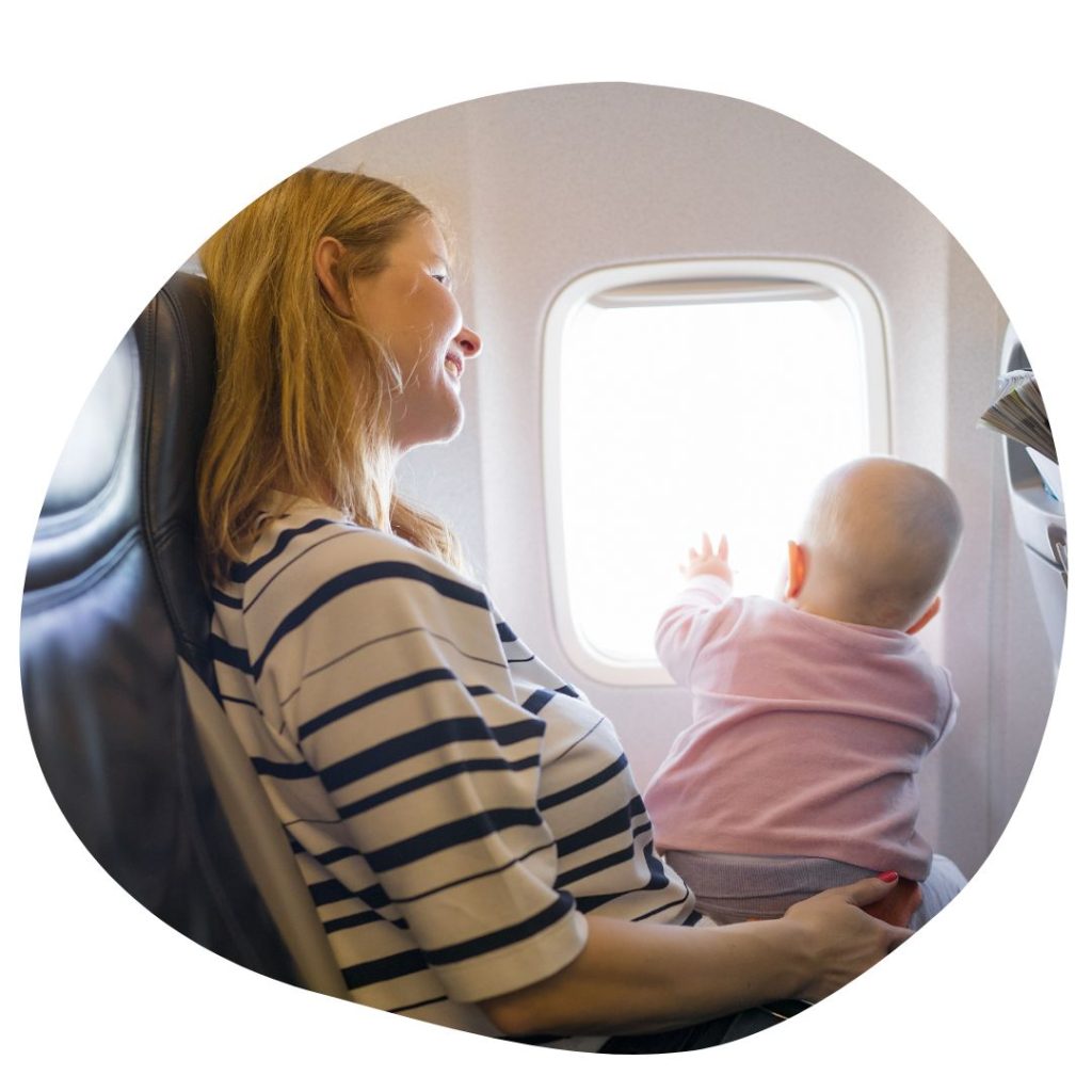 mother with baby on a plane