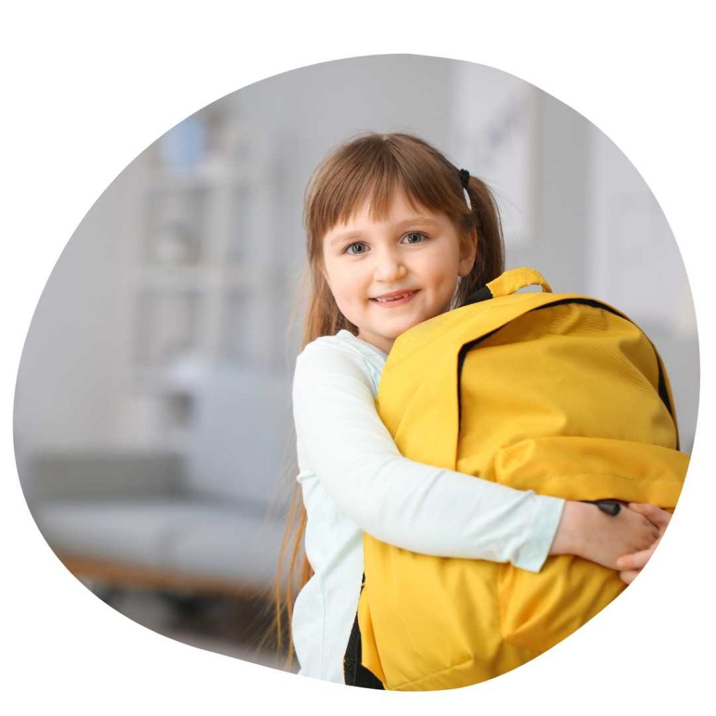 girl holding back pack