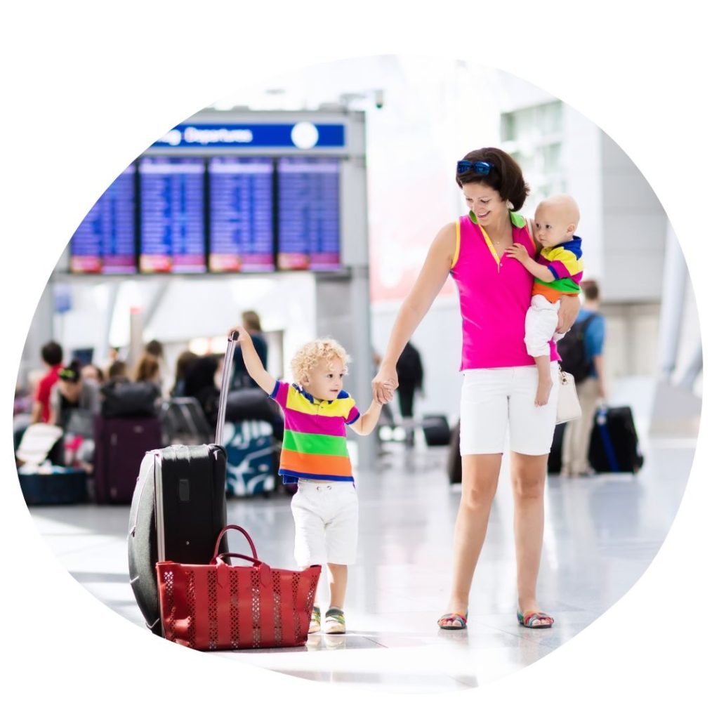 mother with 2 children at an airport