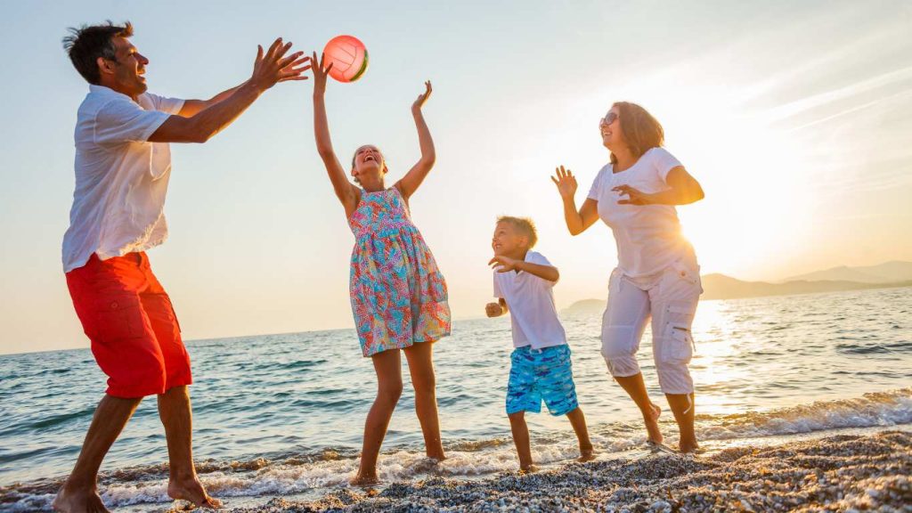 family at the beach in Italy